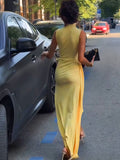 Figure-hugging Pleated Dress With A Slit And Fluttering Ribbons